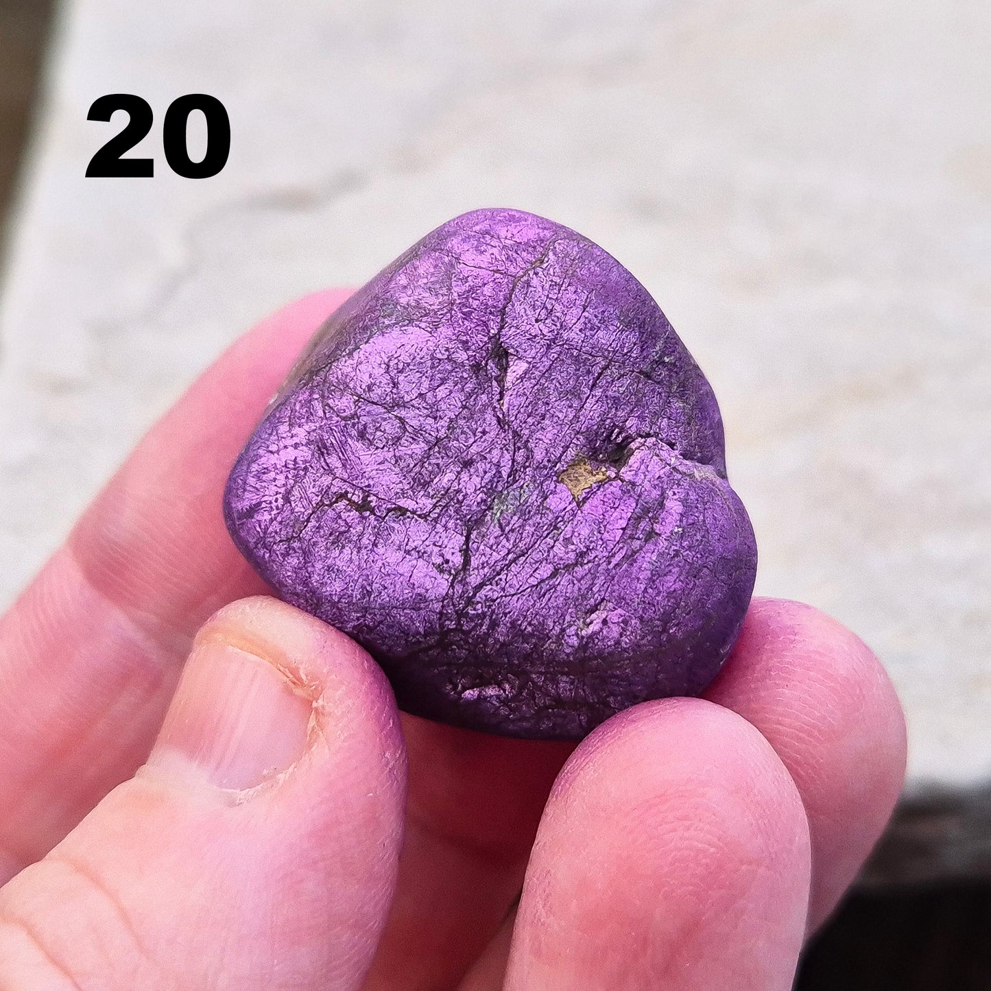 Purpurite. Beautiful purple specimens originating from Namibia. Known for its vibrant purple hue and unique matte, dusty finish. In the right light the purple hue will be more visible.
