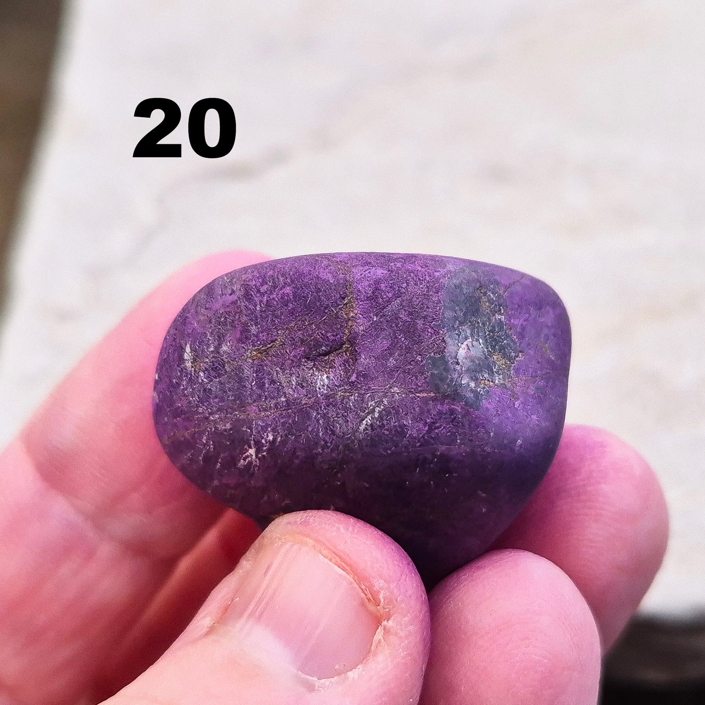 Purpurite. Beautiful purple specimens originating from Namibia. Known for its vibrant purple hue and unique matte, dusty finish. In the right light the purple hue will be more visible.
