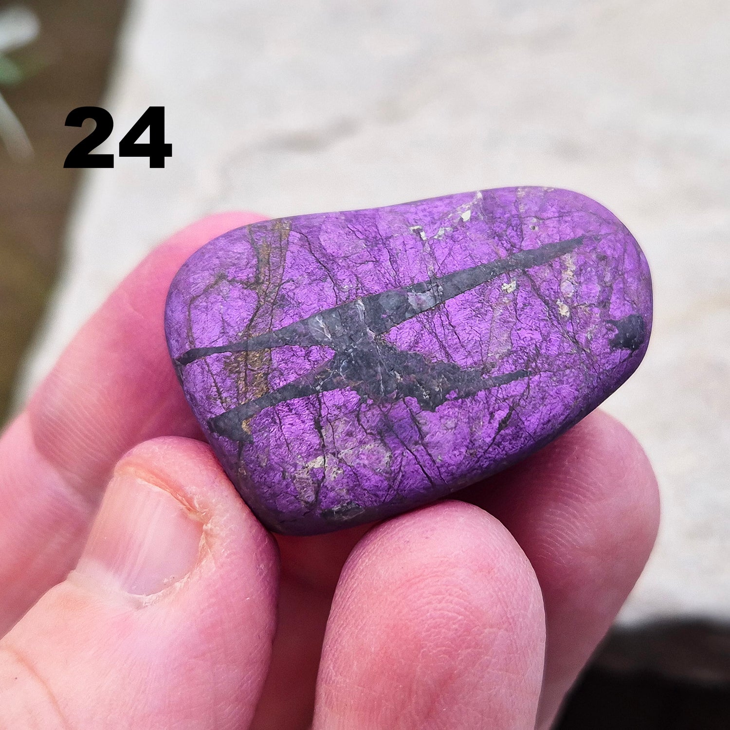 Purpurite. Beautiful purple specimens originating from Namibia. Known for its vibrant purple hue and unique matte, dusty finish. In the right light the purple hue will be more visible.
