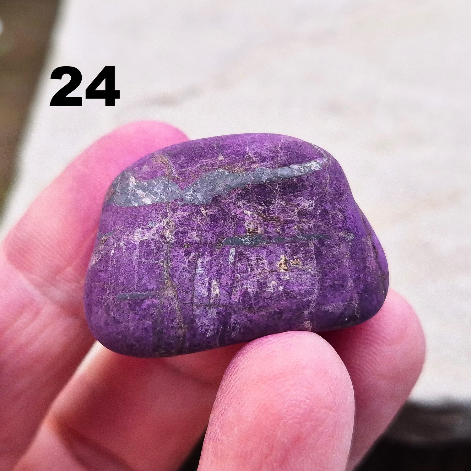 Purpurite. Beautiful purple specimens originating from Namibia. Known for its vibrant purple hue and unique matte, dusty finish. In the right light the purple hue will be more visible.
