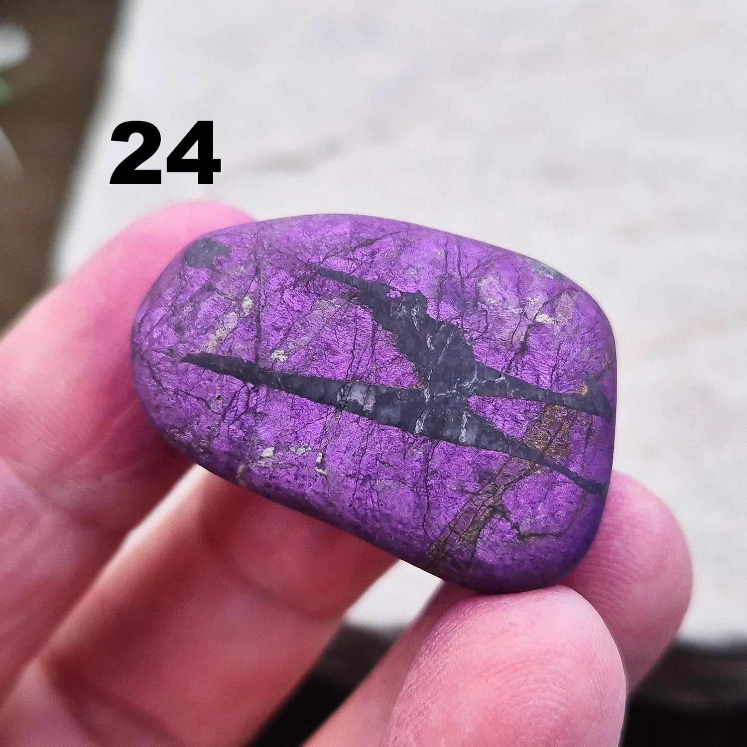 Purpurite. Beautiful purple specimens originating from Namibia. Known for its vibrant purple hue and unique matte, dusty finish. In the right light the purple hue will be more visible.
