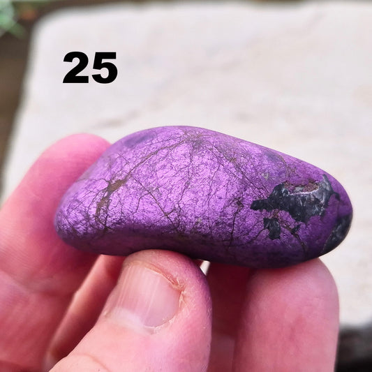 Purpurite. Beautiful purple specimens originating from Namibia. Known for its vibrant purple hue and unique matte, dusty finish. In the right light the purple hue will be more visible.