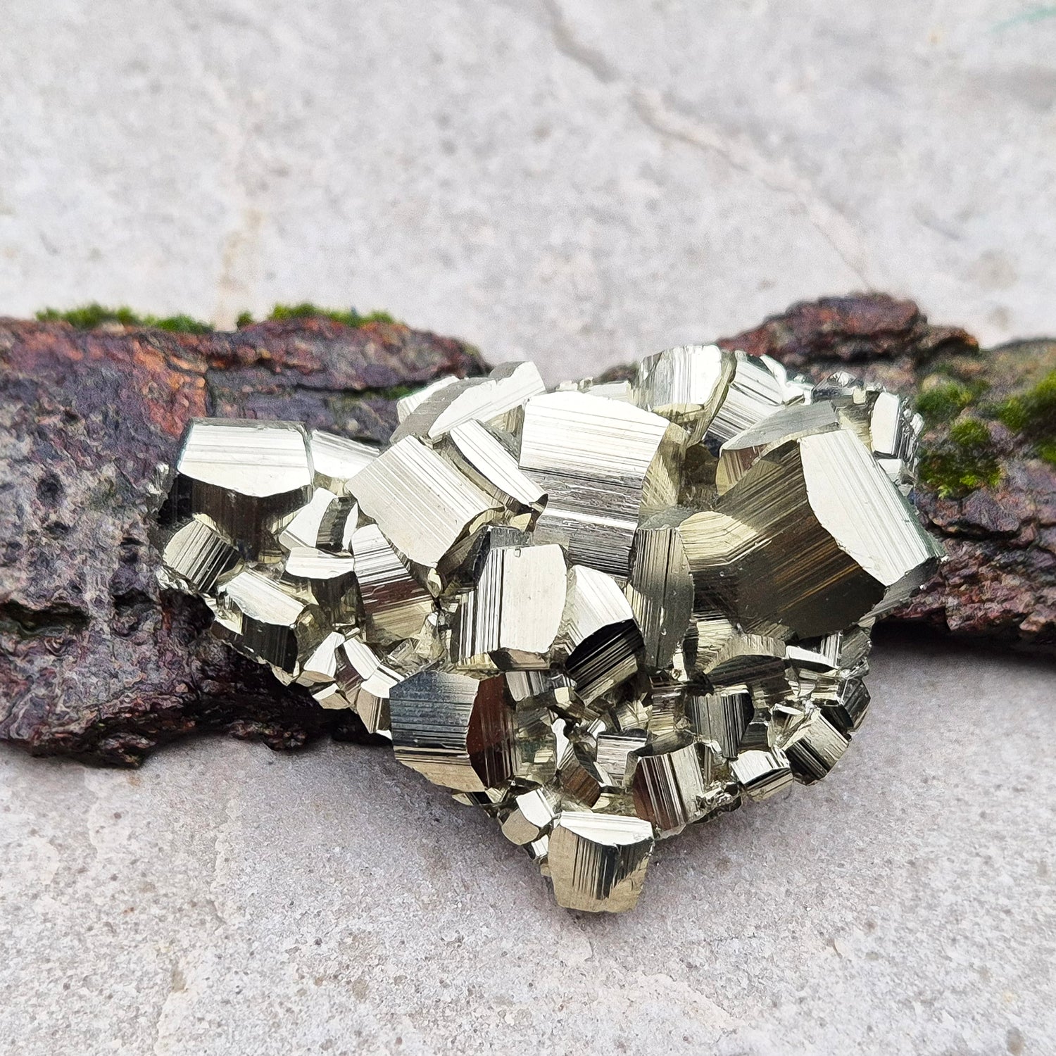 Pyrite Crystal Cluster, from Minas Gerais, Brazil, also known as Fools Gold or Iron Pyrite. Minas Gerais is known for producing high quality Pyrite. This is an A grade specimen with lovely cubic formations.