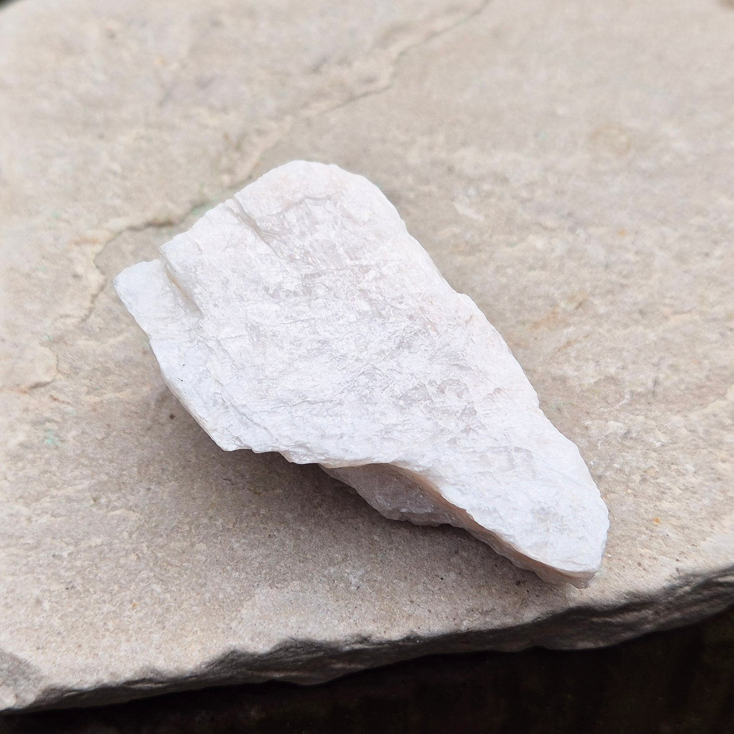 Natural Moonstone (white) crystal. from India. lovely opalescence when light is on the crystal.