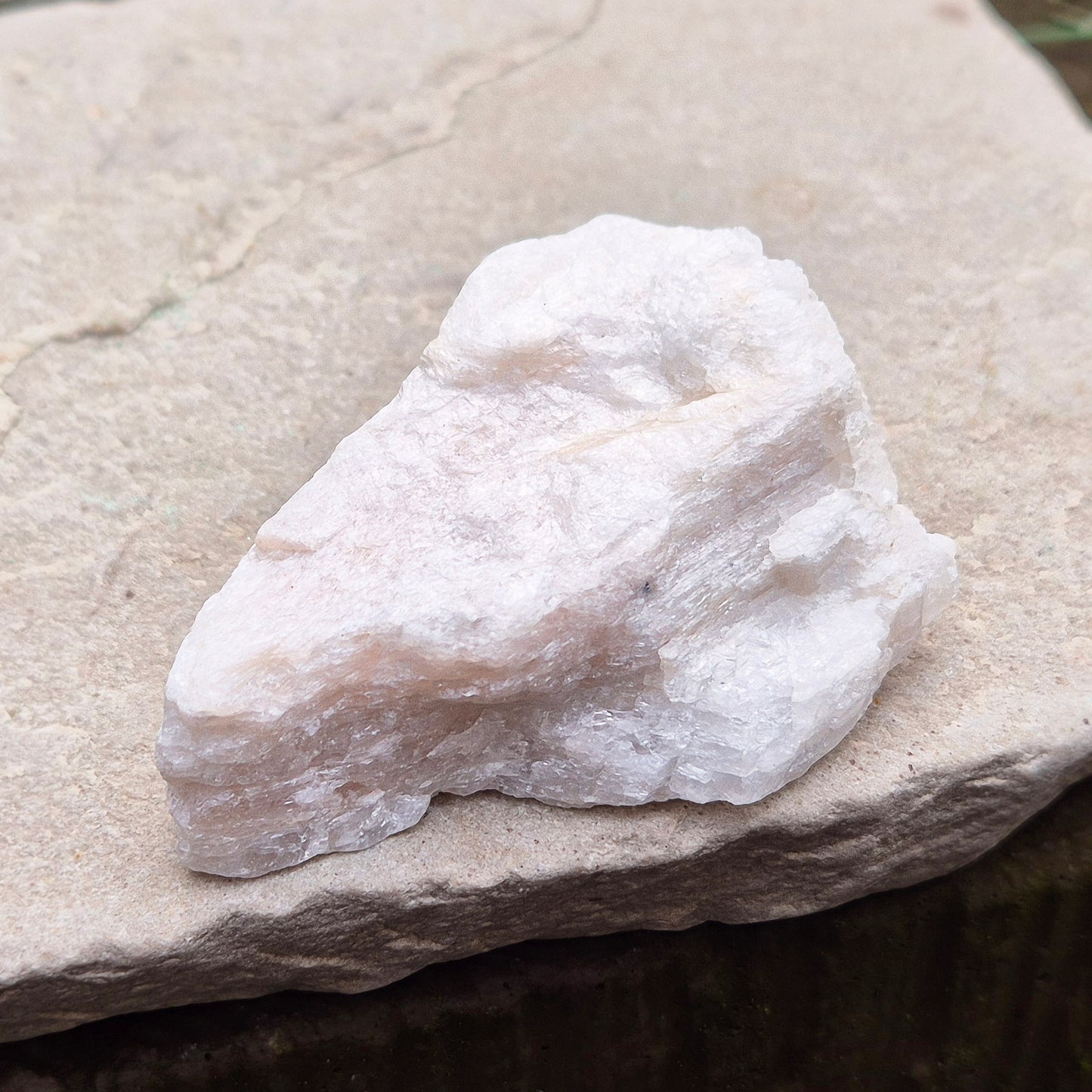 Natural Moonstone (white) crystal. from India. lovely opalescence when light is on the crystal.