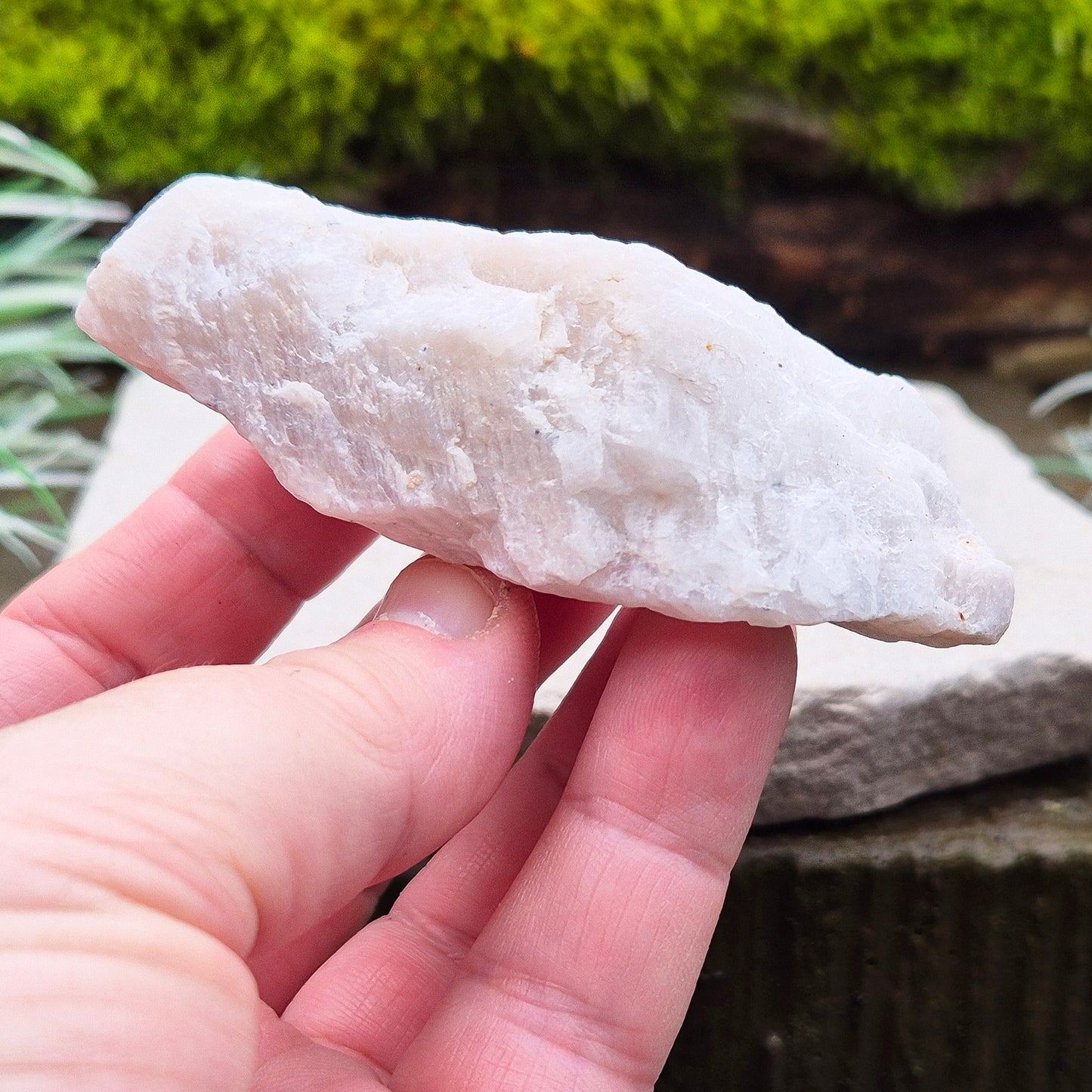 Natural Moonstone (white) crystal. from India. lovely opalescence when light is on the crystal.