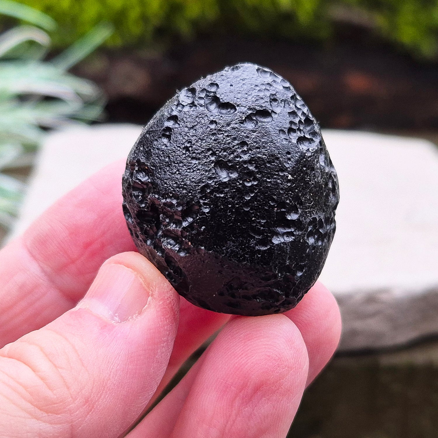 Black Tektite (Indochinite, A Grade) – Dark, glass-like stones formed 700,000 years ago by meteorite impacts that ejected material into Earth’s upper atmosphere. 