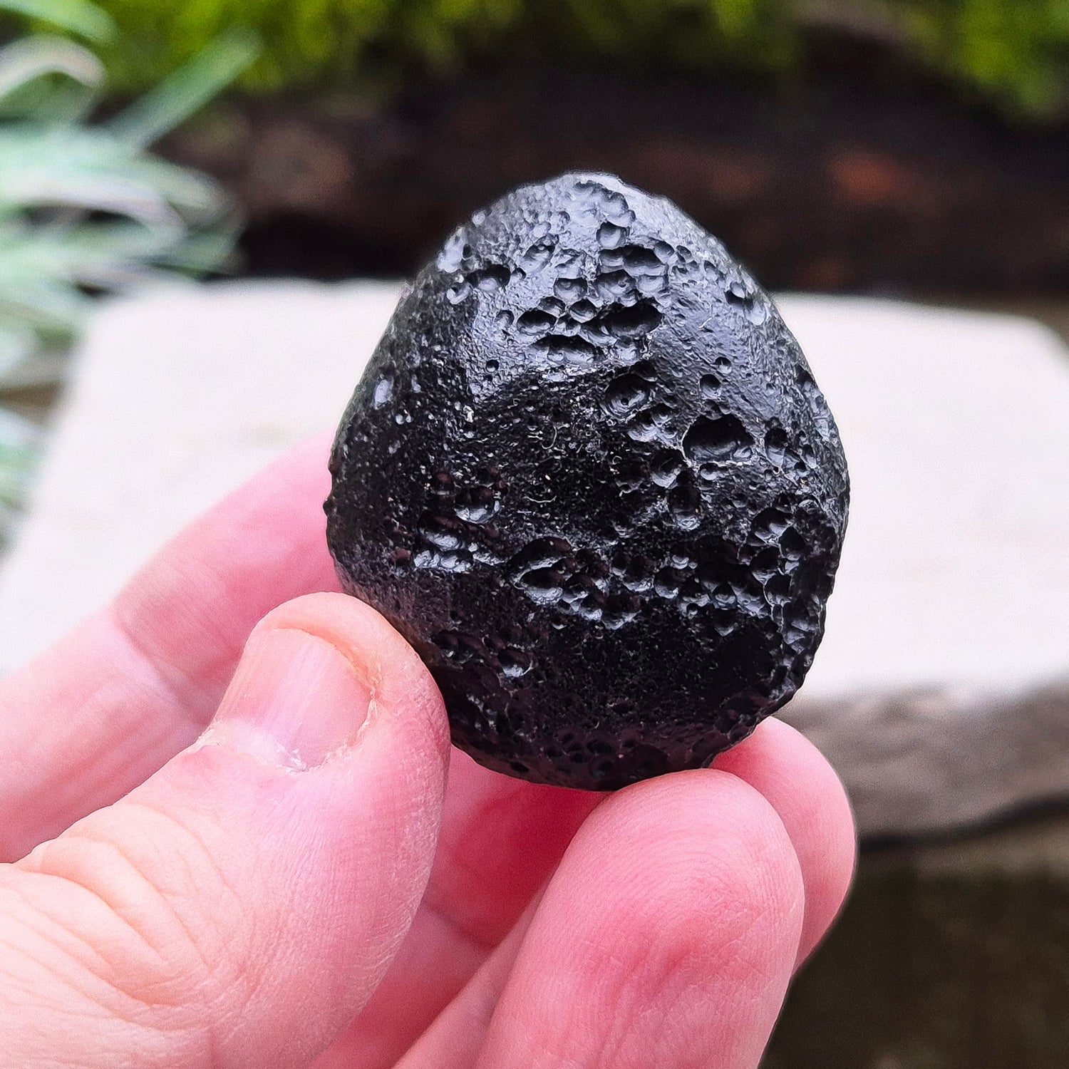 Black Tektite (Indochinite, A Grade) – Dark, glass-like stones formed 700,000 years ago by meteorite impacts that ejected material into Earth’s upper atmosphere. 