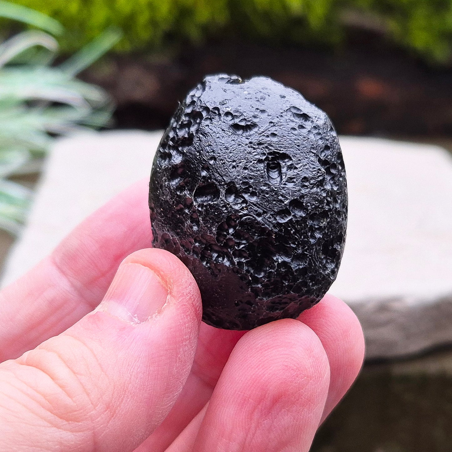 Black Tektite (Indochinite, A Grade) – Dark, glass-like stones formed 700,000 years ago by meteorite impacts that ejected material into Earth’s upper atmosphere. 