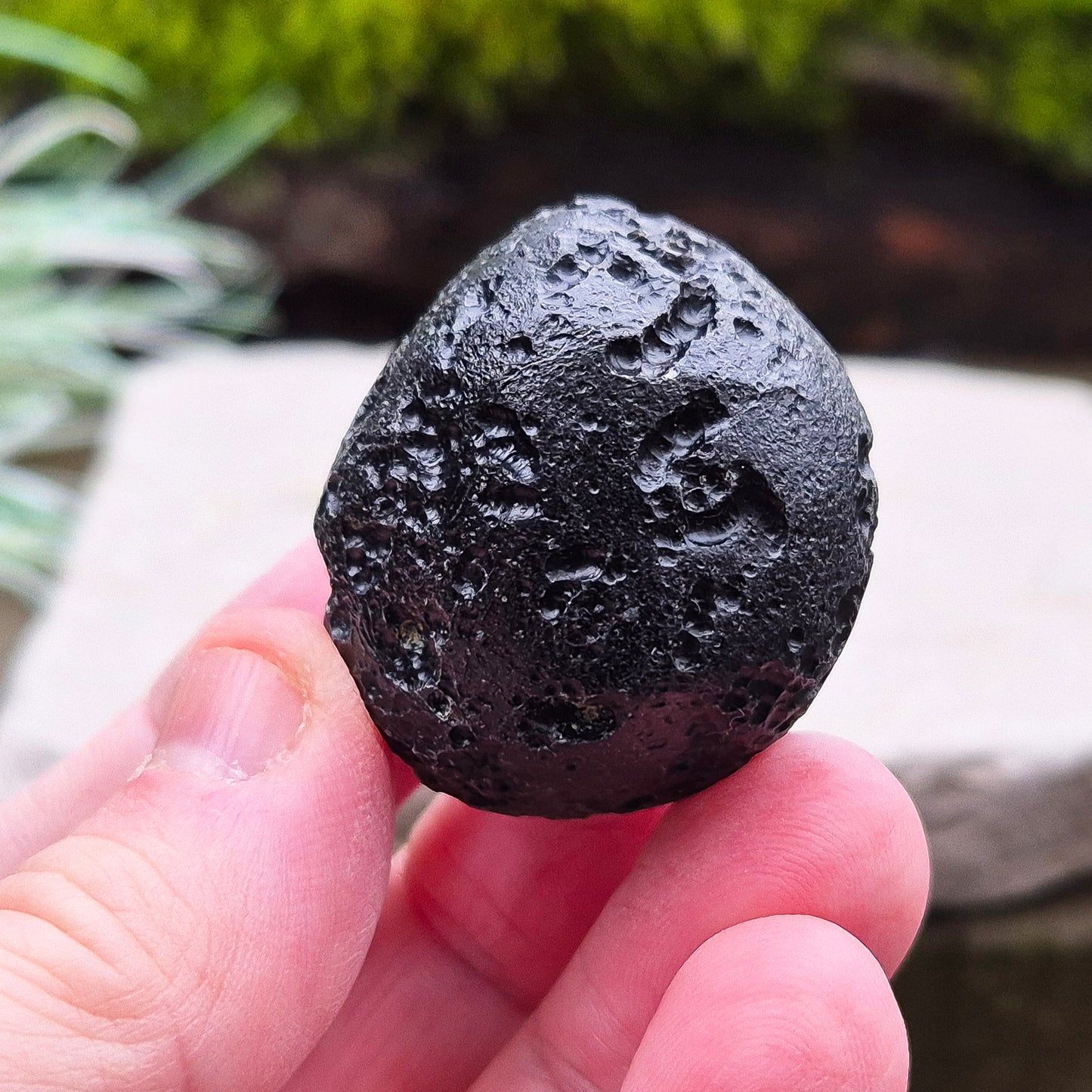 Black Tektite (Indochinite, A Grade) – Dark, glass-like stones formed 700,000 years ago by meteorite impacts that ejected material into Earth’s upper atmosphere. 