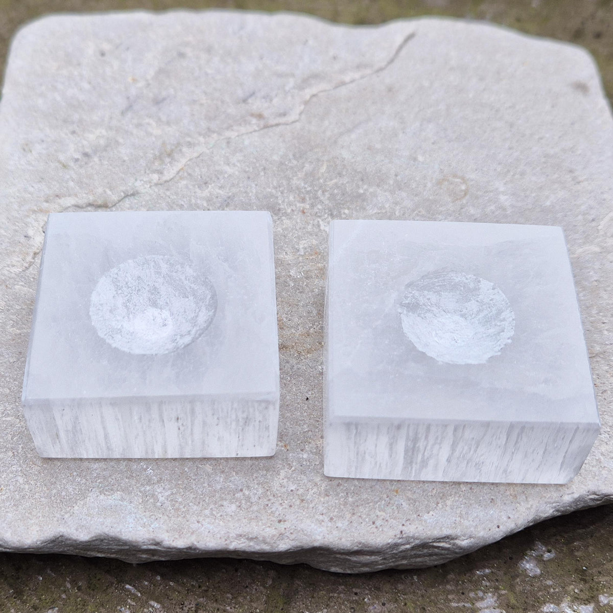 Mini Selenite sphere stand for cleansing, charging and displaying your crystal spheres. A simple, useful addition to any collection.