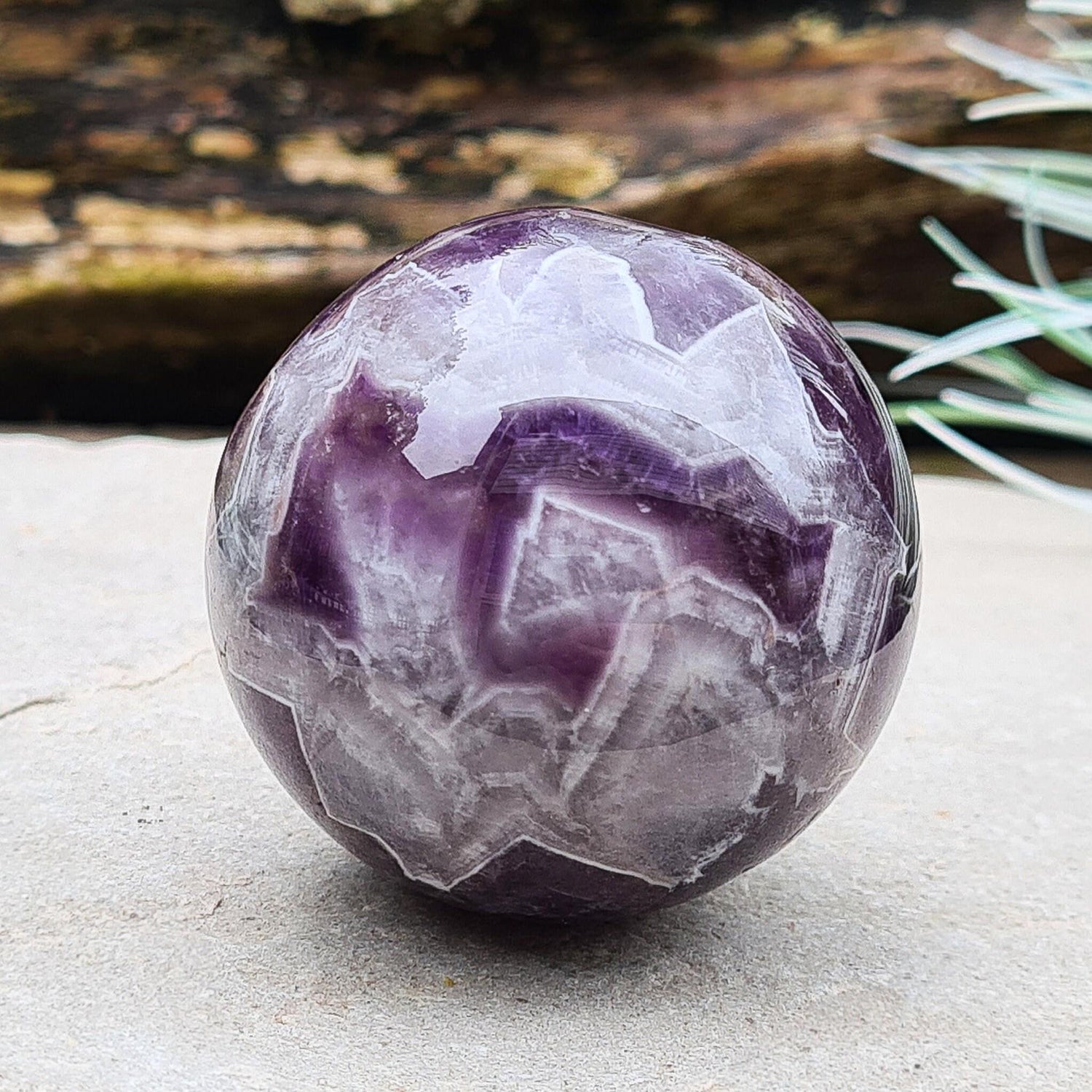 Chevron Amethyst Crystal Ball or Sphere. I will include an acrylic stand similar to that shown in the photos. Chevron Amethyst is naturally occurring Amethyst and White Quartz in a banded pattern. A powerful crystal to have in your collection. 