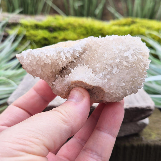 Quartz Crystal Cluster. From Indonesia. This cluster has fine needle like crystal points covering the base matrix. A goreous and very unique cluster.