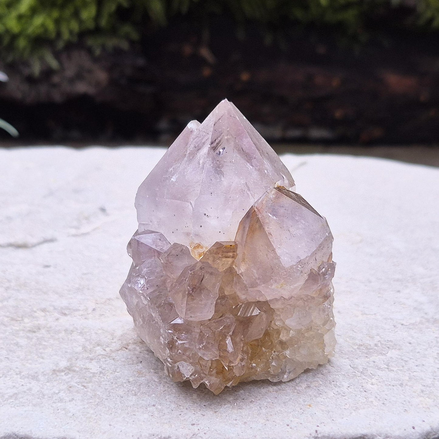 Spirit Quartz Crystal Cluster, also known as Cactus Quartz, originates from north of Pretoria in South Africa’s Gauteng province. This unique crystal features a central quartz point surrounded by smaller druzy quartz crystals.