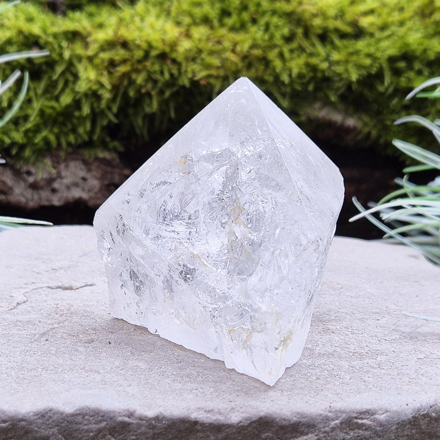 Quartz Crystal Standing Point, from Brazil. Point is polished at tip, sides are natural and the base is cut flat so it will sit on an even surface. Lovely clarity and light refraction within it.