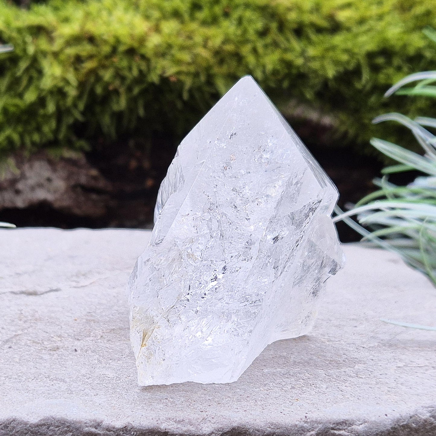 Quartz Crystal Standing Point, from Brazil. Point is polished at tip, sides are natural and the base is cut flat so it will sit on an even surface. Lovely clarity and light refraction within it.