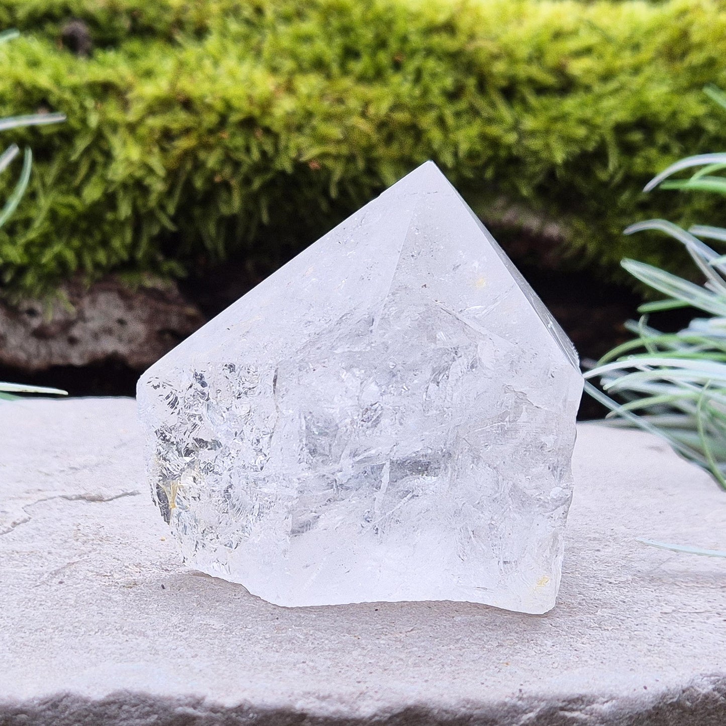 Quartz Crystal Standing Point, from Brazil. Point is polished at tip, sides are natural and the base is cut flat so it will sit on an even surface. Lovely clarity and light refraction within it.