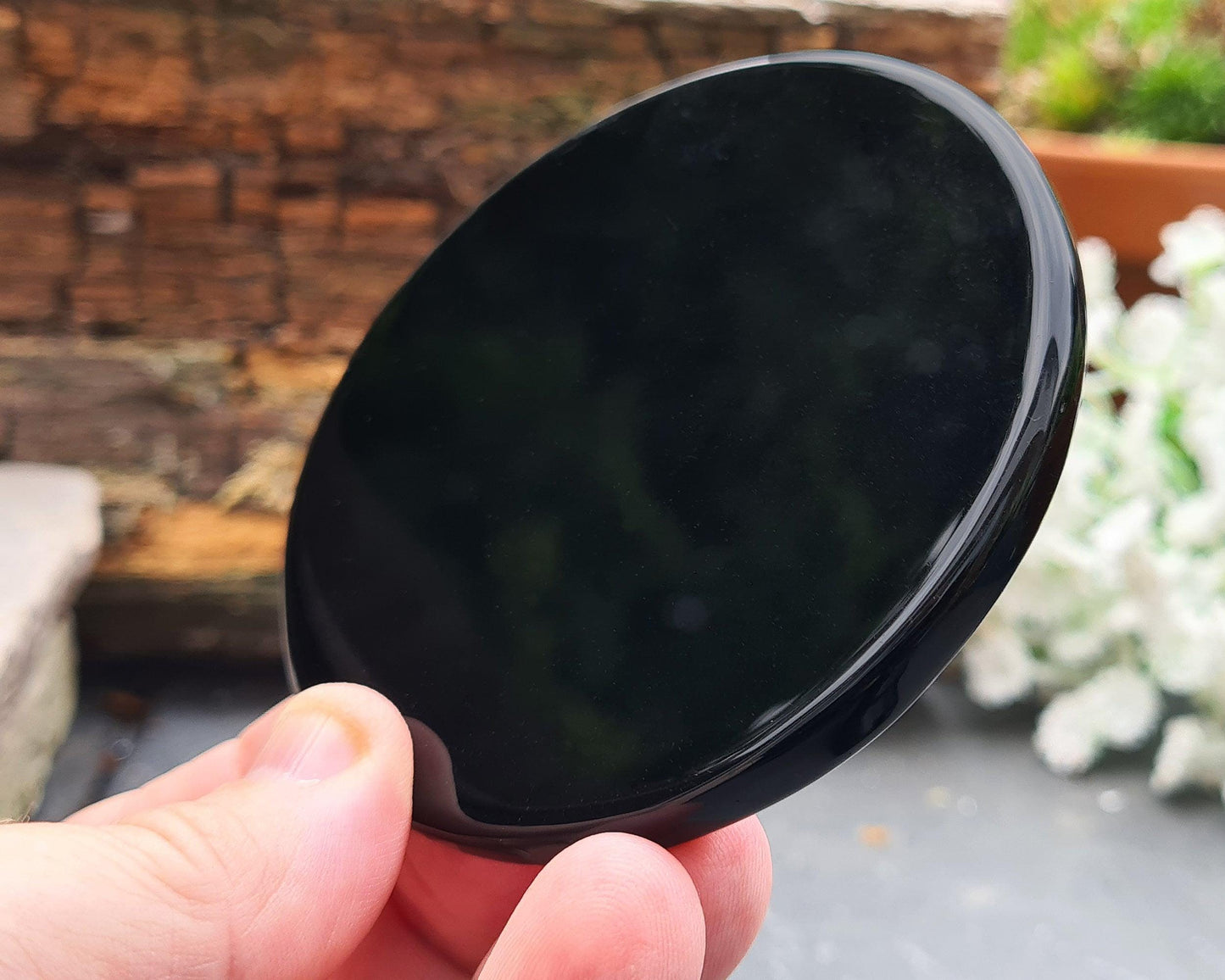 Polished Black Obsidian mirror from Mexico. A striking, high-gloss stone, perfect for reflection, focus, and a unique addition to any collection.