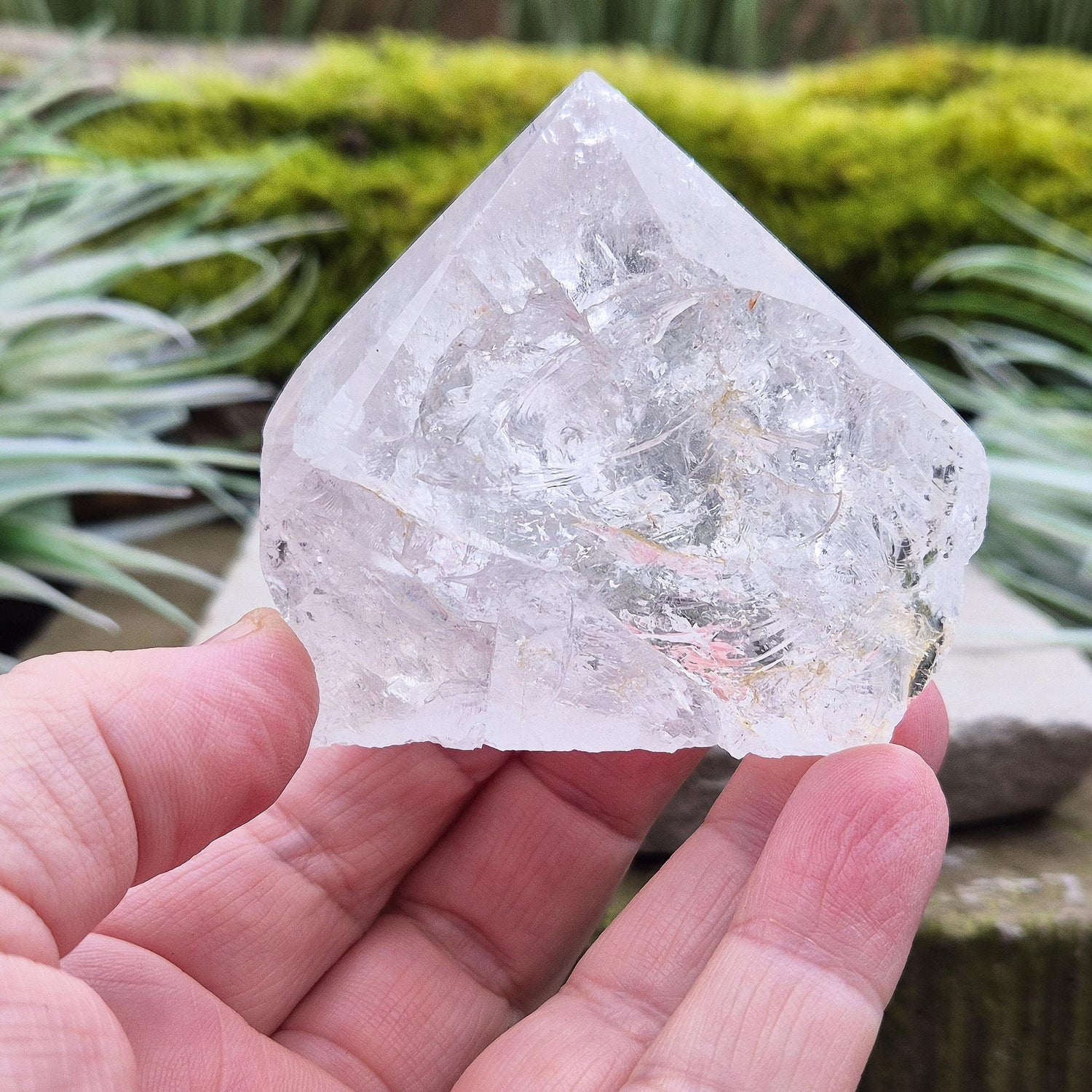 Quartz Crystal Standing Point, from Brazil. Point is polished at tip, sides are natural and the base is cut flat so it will sit on an even surface. Lovely clarity and light refraction within it.