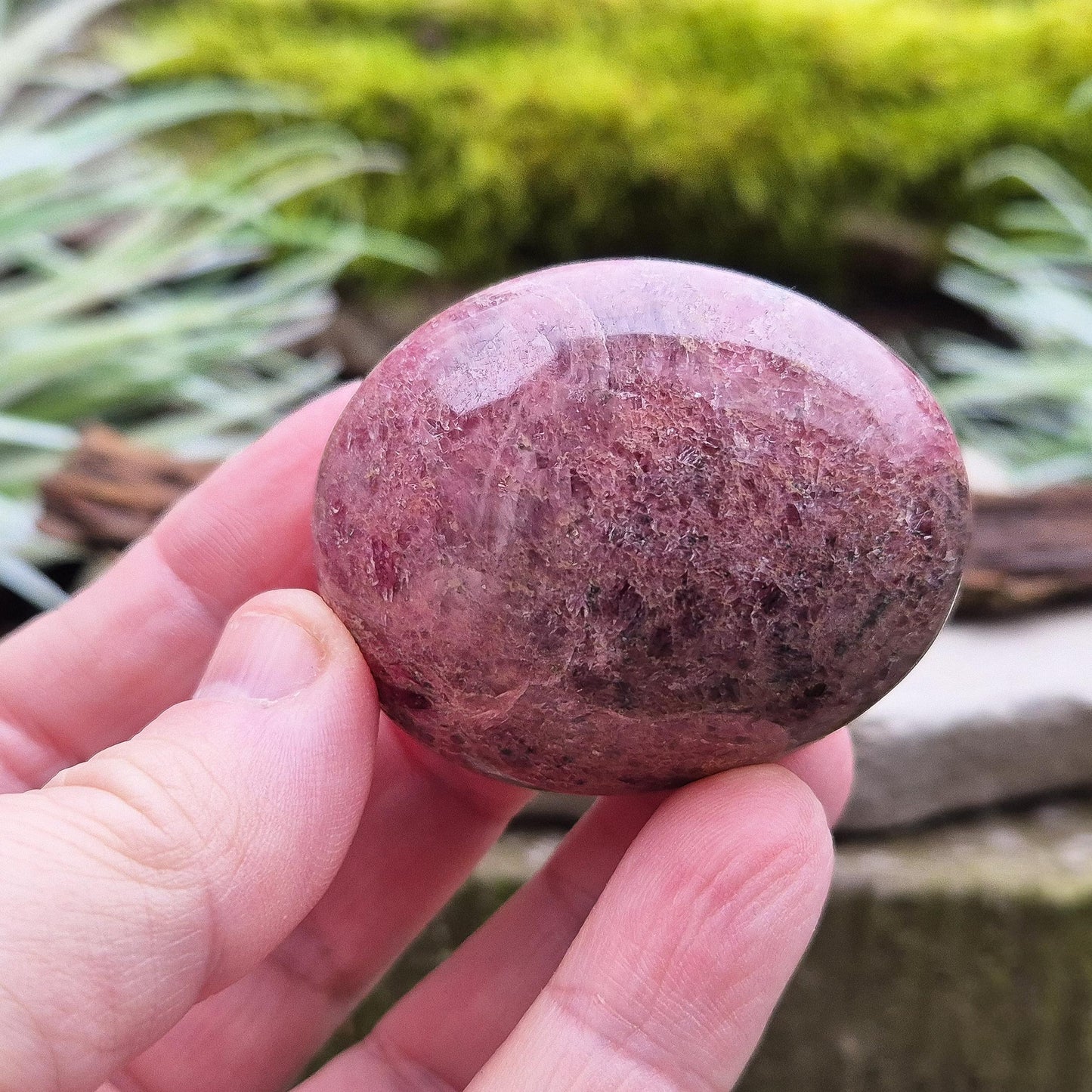 Rhodonite Crystal Pebble, Zimbabwe. Lovely Pink colouring with some black patches caused by the oxidation of Manganese. Lovely shimmer on the surface.