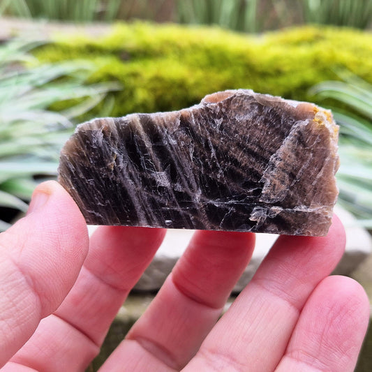 Black Moonstone from Madagascar, natural piece. Black Moonstone is a variety of moonstone that features dark shades, often with a subtle shimmer. 