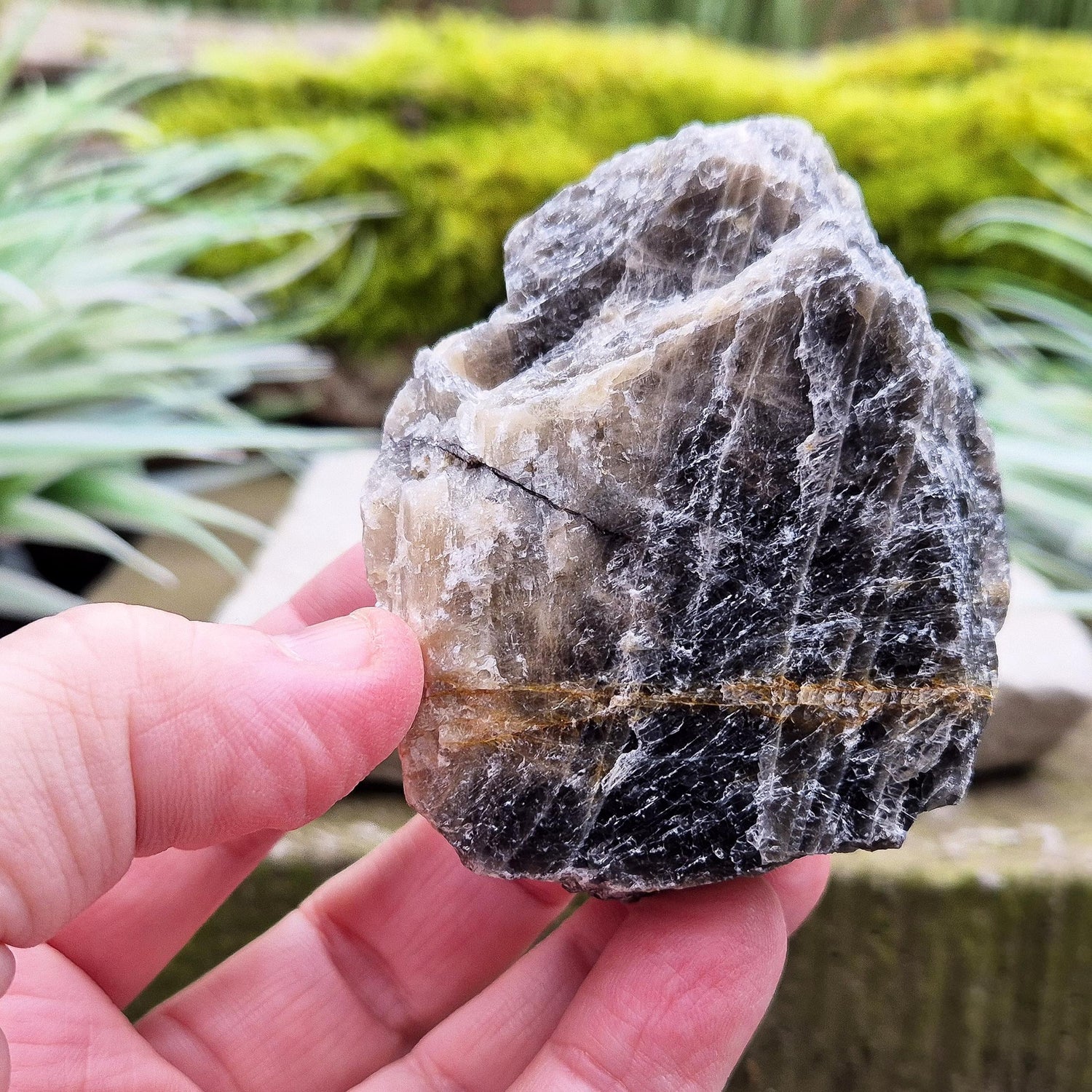 Black Moonstone from Madagascar, natural piece. Black Moonstone is a variety of moonstone that features dark shades, often with a subtle shimmer. 