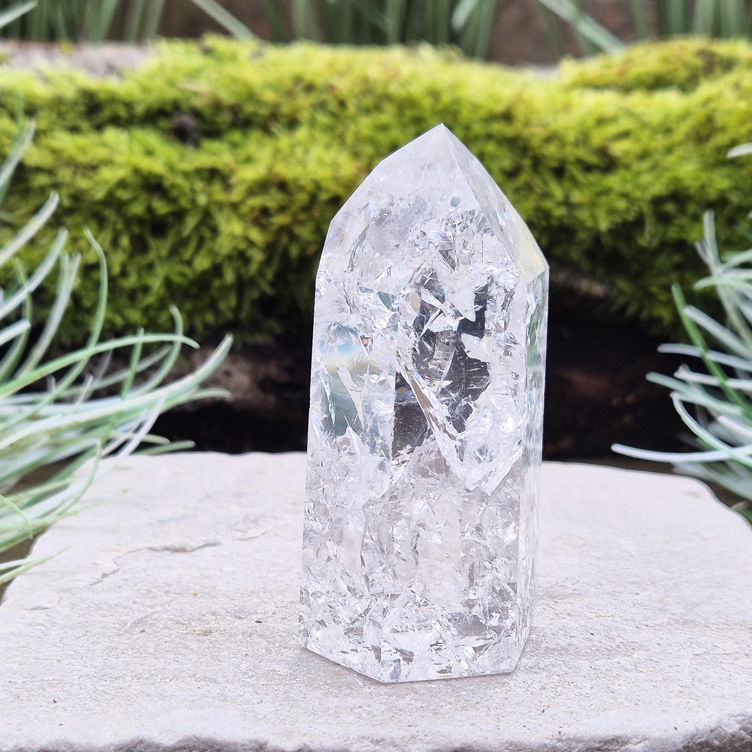 Fire and Ice Quartz Polished Standing Point (also known as Rainbow Quartz) is created by heating and rapidly cooling quartz. 