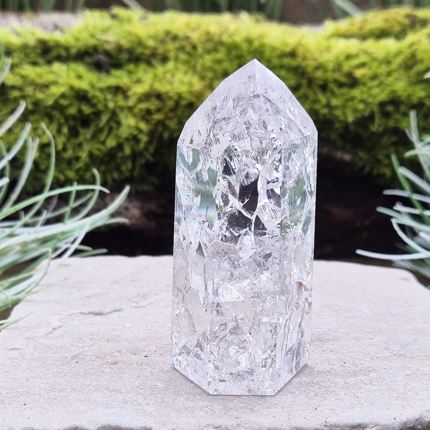 Fire and Ice Quartz Polished Standing Point (also known as Rainbow Quartz) is created by heating and rapidly cooling quartz. 