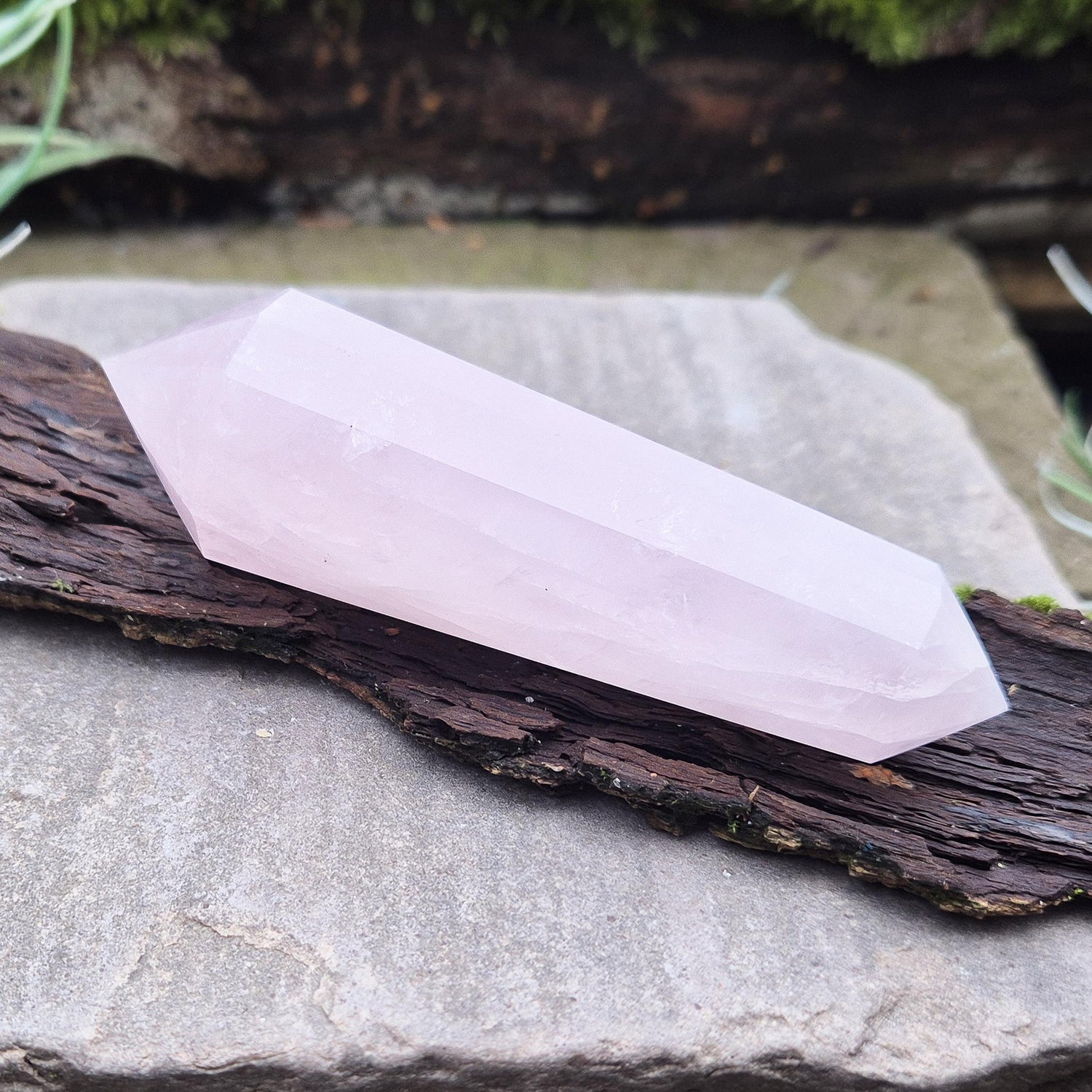 Rose Quartz Double Terminated Vogel Cut Wand from Brazil. Lovely pale pink colouring. 12 sided. One larger end, and one smaller end.