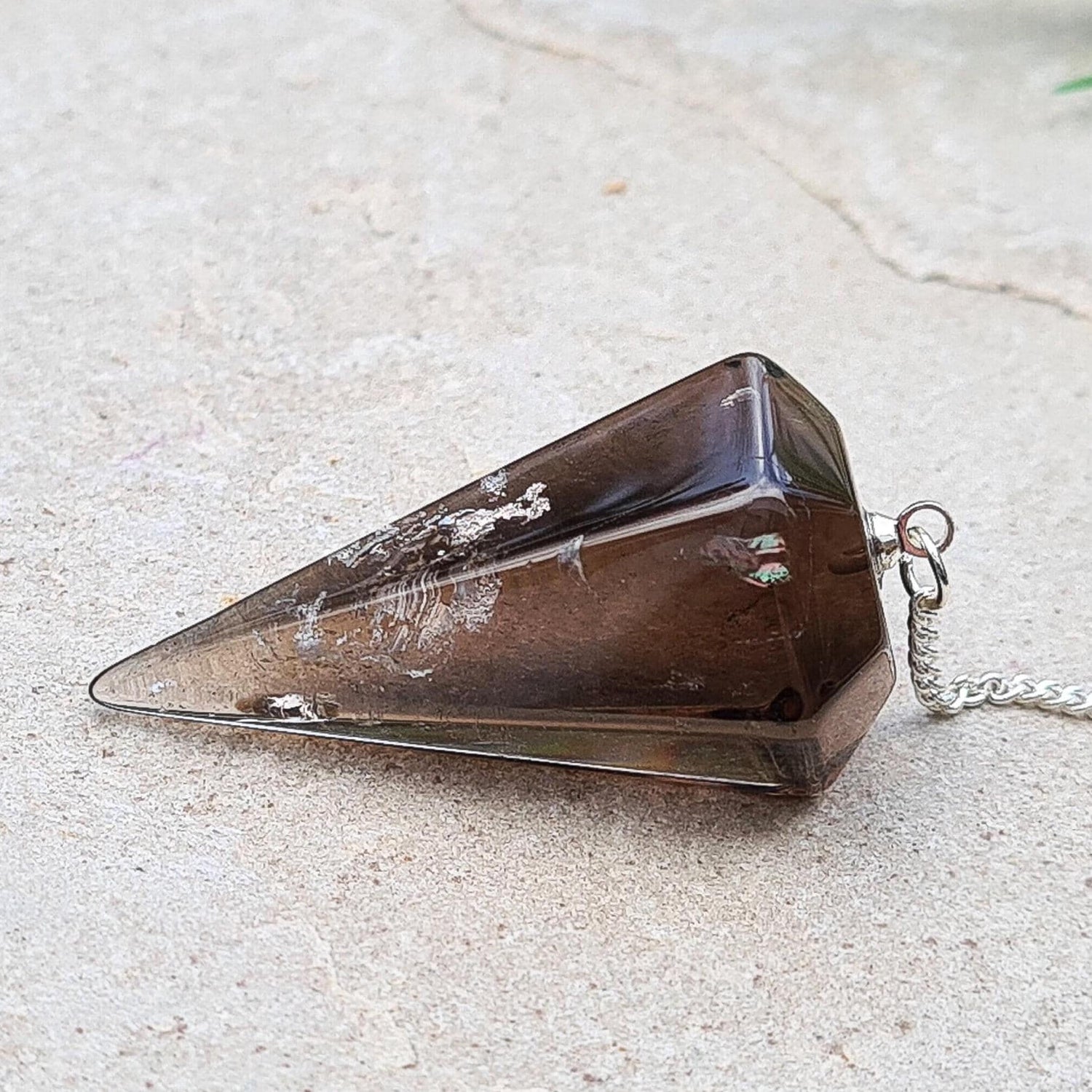 Smoky Quartz Crystal Pendulum, Smoky Quartz Crystal Dowser with brown bead on end of chain. From Brazil.&nbsp; This is natural Smoky Quartz NOT irradiated Smoky Quartz.