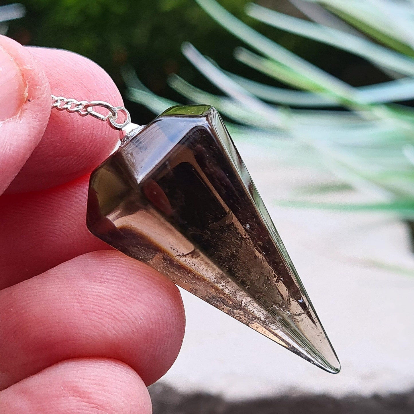 Smoky Quartz Crystal Pendulum, Smoky Quartz Crystal Dowser with brown bead on end of chain. From Brazil.&nbsp; This is natural Smoky Quartz NOT irradiated Smoky Quartz.