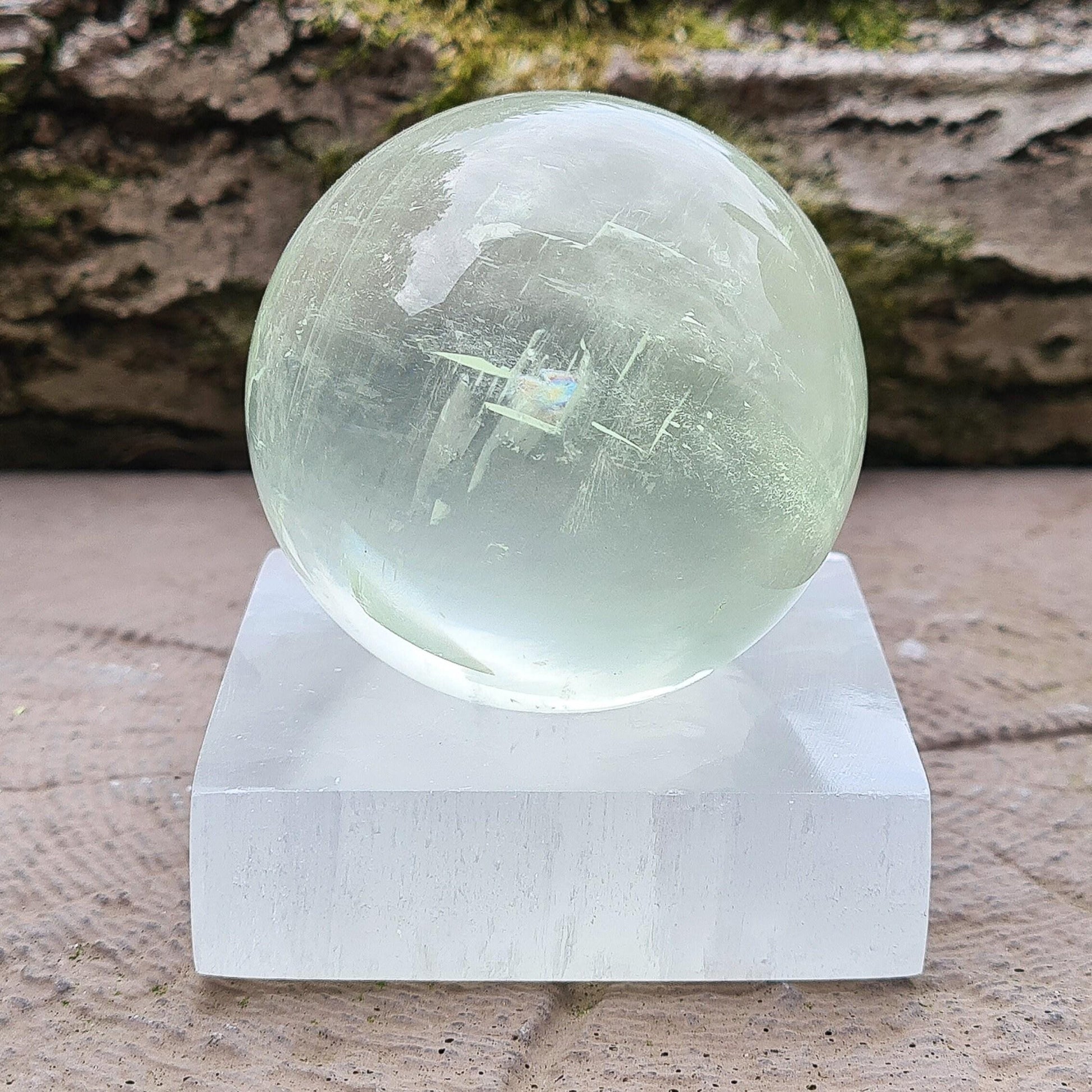 Display your crystal balls/spheres in style and have them ready cleansed and charged for use with this selenite crystal ball stand. 