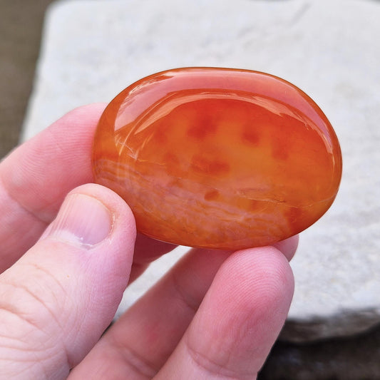 Crackle Agate Palm Stone. Crackle Agate is a stunning variety of chalcedony, a microcrystalline form of quartz, that undergoes a special heat treatment to create intricate internal fractures.