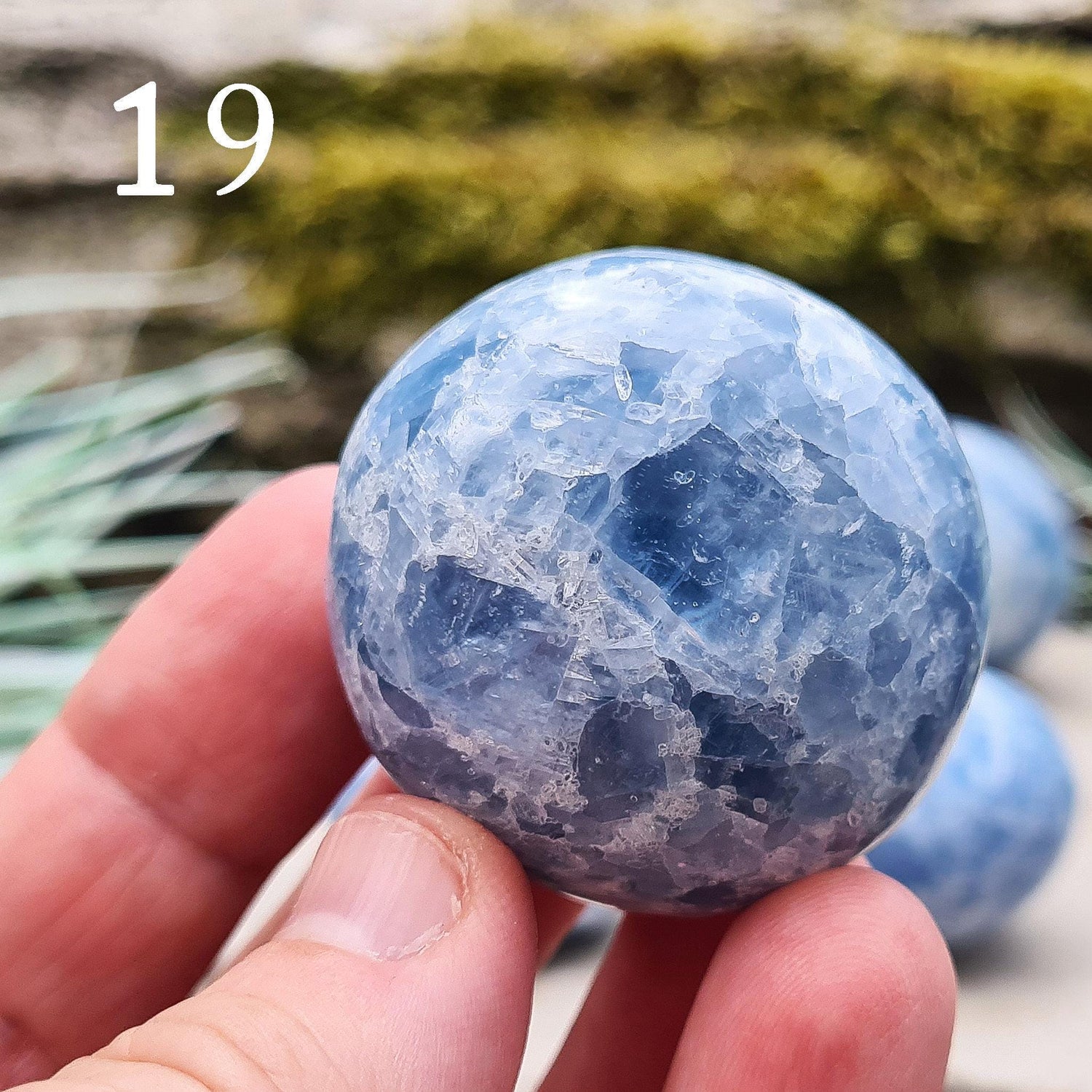 Blue Calcite Crystal, polished from Madagascar. These are a lovely bright blue colour. Almost spherical. Great size to be used in many ways.