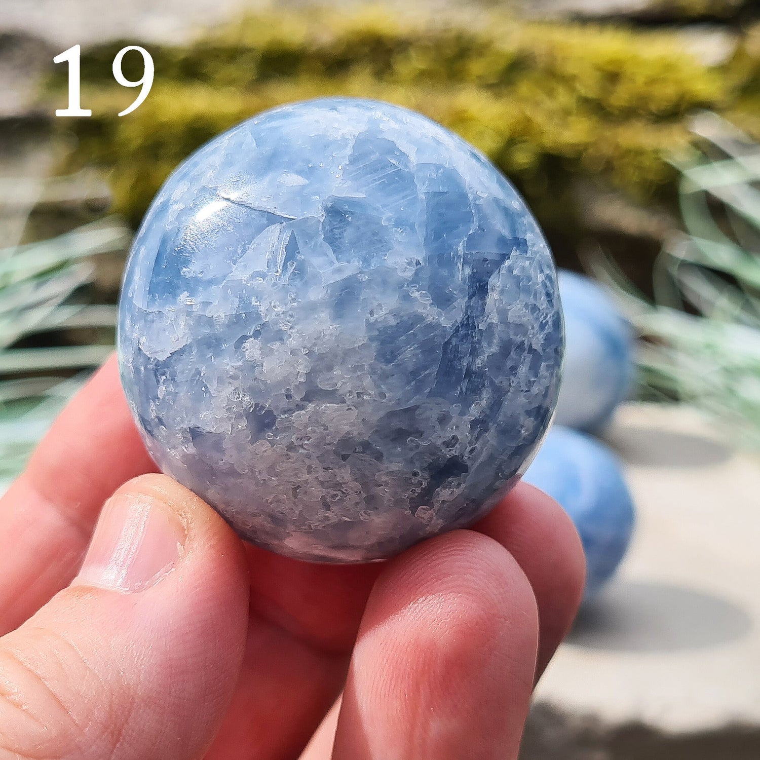 Blue Calcite Crystal, polished from Madagascar. These are a lovely bright blue colour. Almost spherical. Great size to be used in many ways.