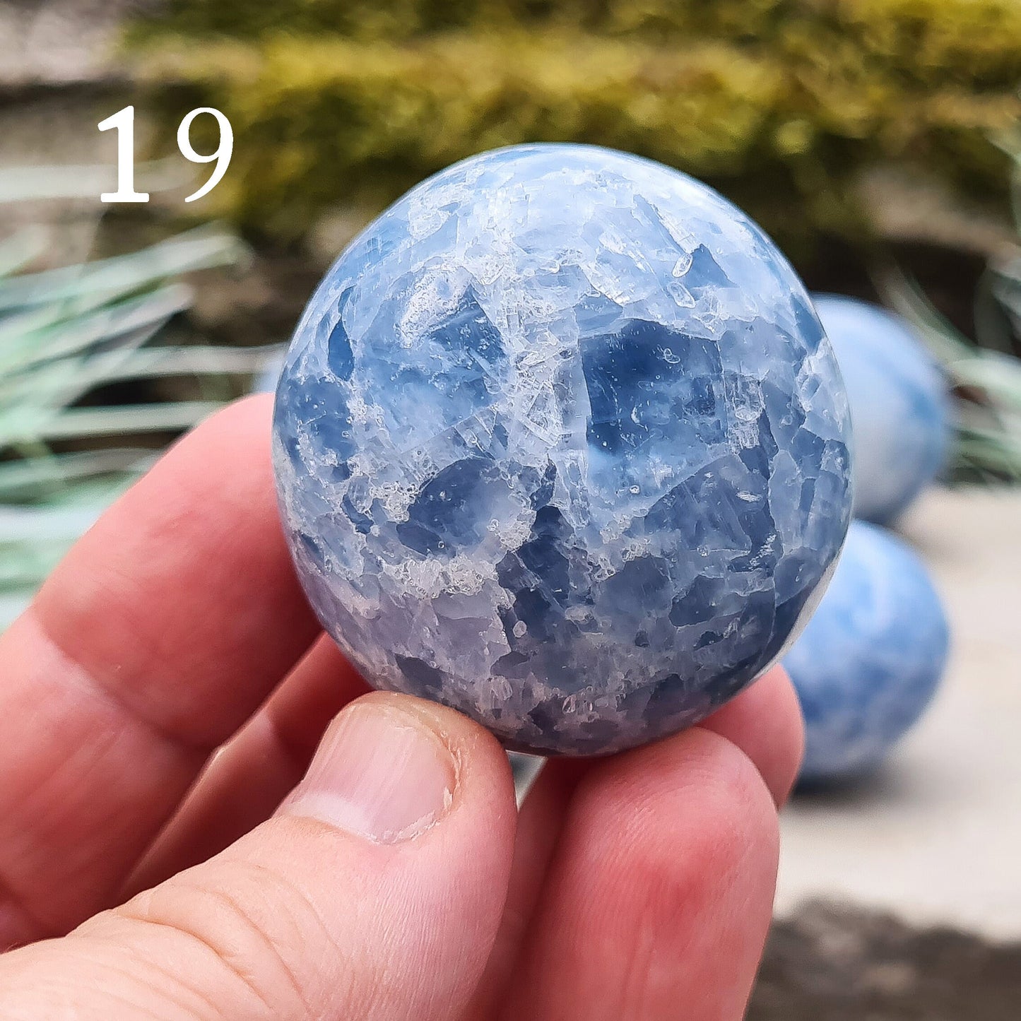 Blue Calcite Crystal, polished from Madagascar. These are a lovely bright blue colour. Almost spherical. Great size to be used in many ways.