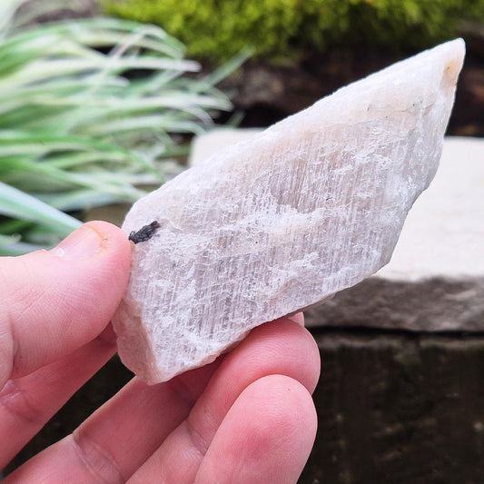 Natural Moonstone (white) crystal. from India. lovely opalescence when light is on the crystal.