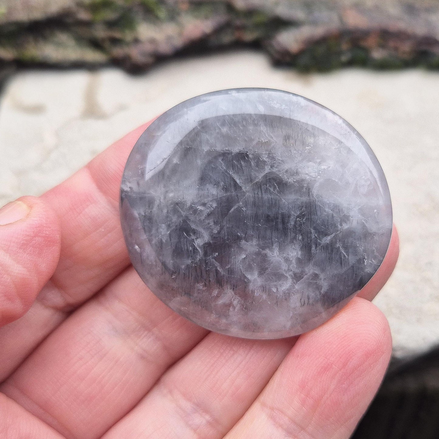 Lunar Quartz Crystal Palm Stone, also known as Lunar Rose Quartz, comes from Namibia.