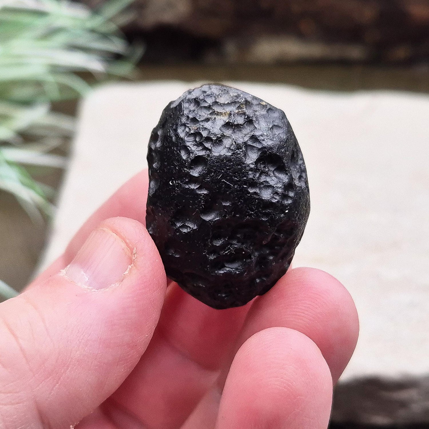 Black Tektite (Indochinite, A Grade) – Dark, glass-like stones formed 700,000 years ago by meteorite impacts that ejected material into Earth’s upper atmosphere. Found across the Indochinese peninsula, from Australia to China, 