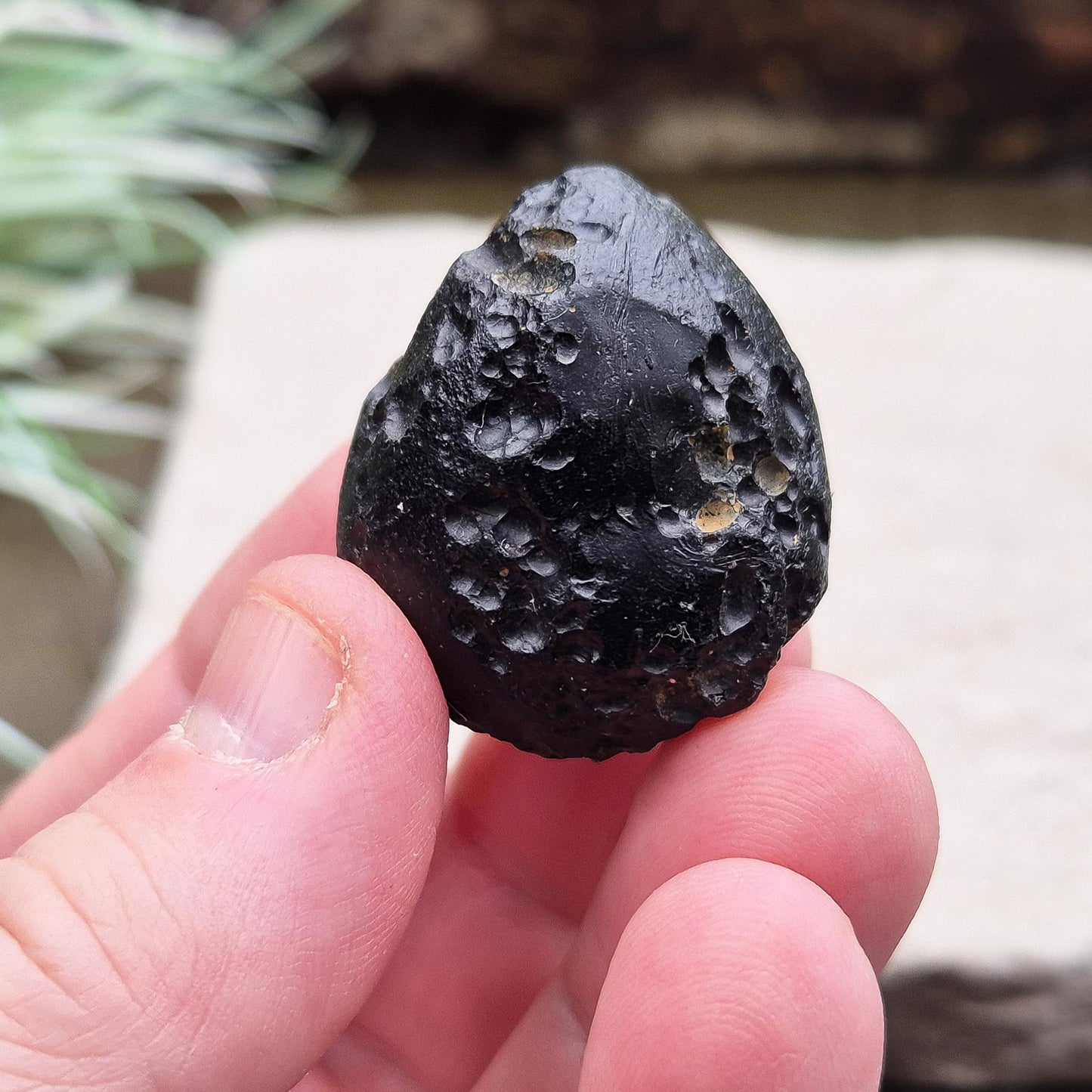 Black Tektite (Indochinite, A Grade) – Dark, glass-like stones formed 700,000 years ago by meteorite impacts that ejected material into Earth’s upper atmosphere. Found across the Indochinese peninsula, from Australia to China, 