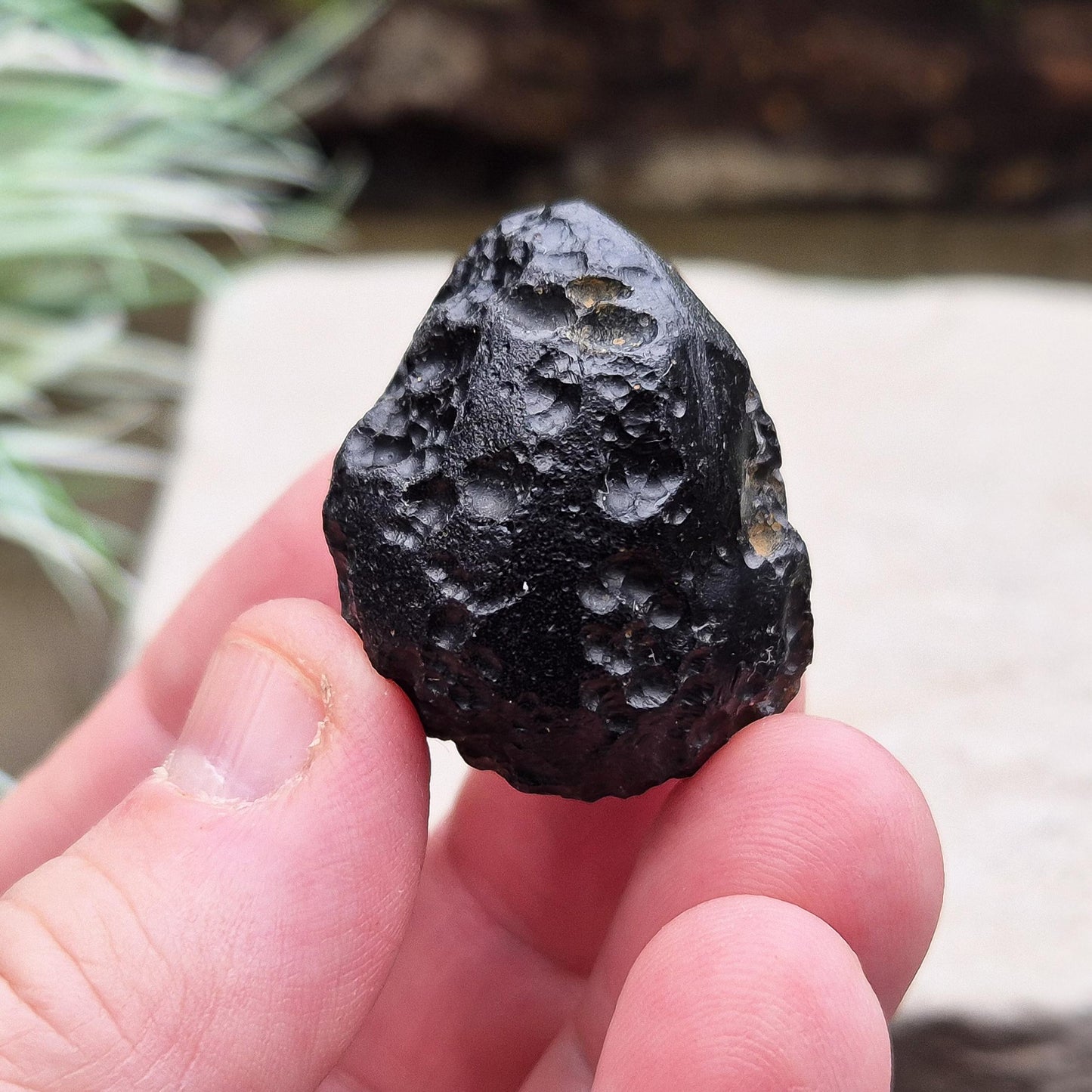 Black Tektite (Indochinite, A Grade) – Dark, glass-like stones formed 700,000 years ago by meteorite impacts that ejected material into Earth’s upper atmosphere. Found across the Indochinese peninsula, from Australia to China, 