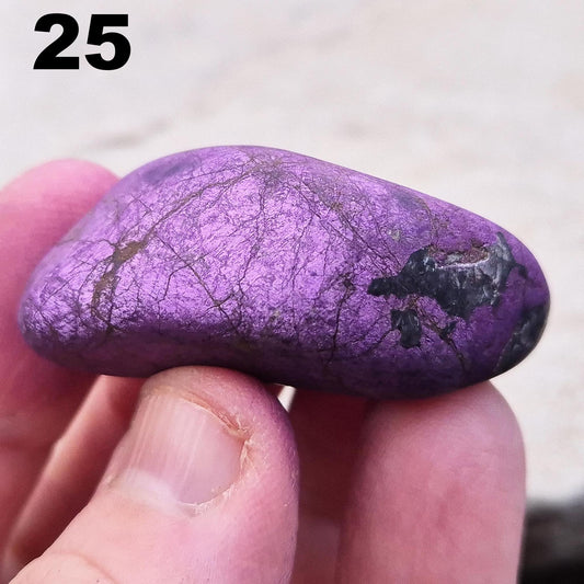 Purpurite. Beautiful purple specimens originating from Namibia. Known for its vibrant purple hue and unique matte, dusty finish. In the right light the bright shiny purple hue will be more visible.