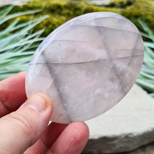 Lunar Quartz Crystal Palm Stone, also known as Lunar Rose Quartz, comes from Namibia.