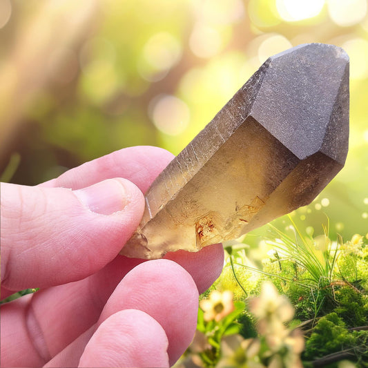 Natural Untreated Citrine Crystal Point from Northern Zambia, has a nice dark honey colour. Raw and unpolished, this crystal point offers an authentic, natural touch to any collection. Great for personal use in meditation or energy work.