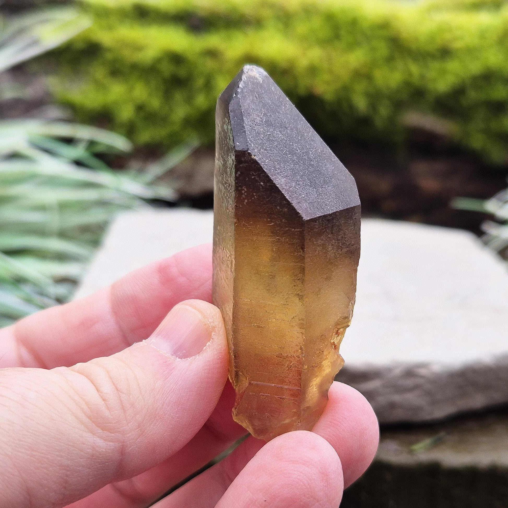 Natural Untreated Citrine Crystal Point from Northern Zambia, has a nice dark honey colour. Raw and unpolished, this crystal point offers an authentic, natural touch to any collection. Great for personal use in meditation or energy work.