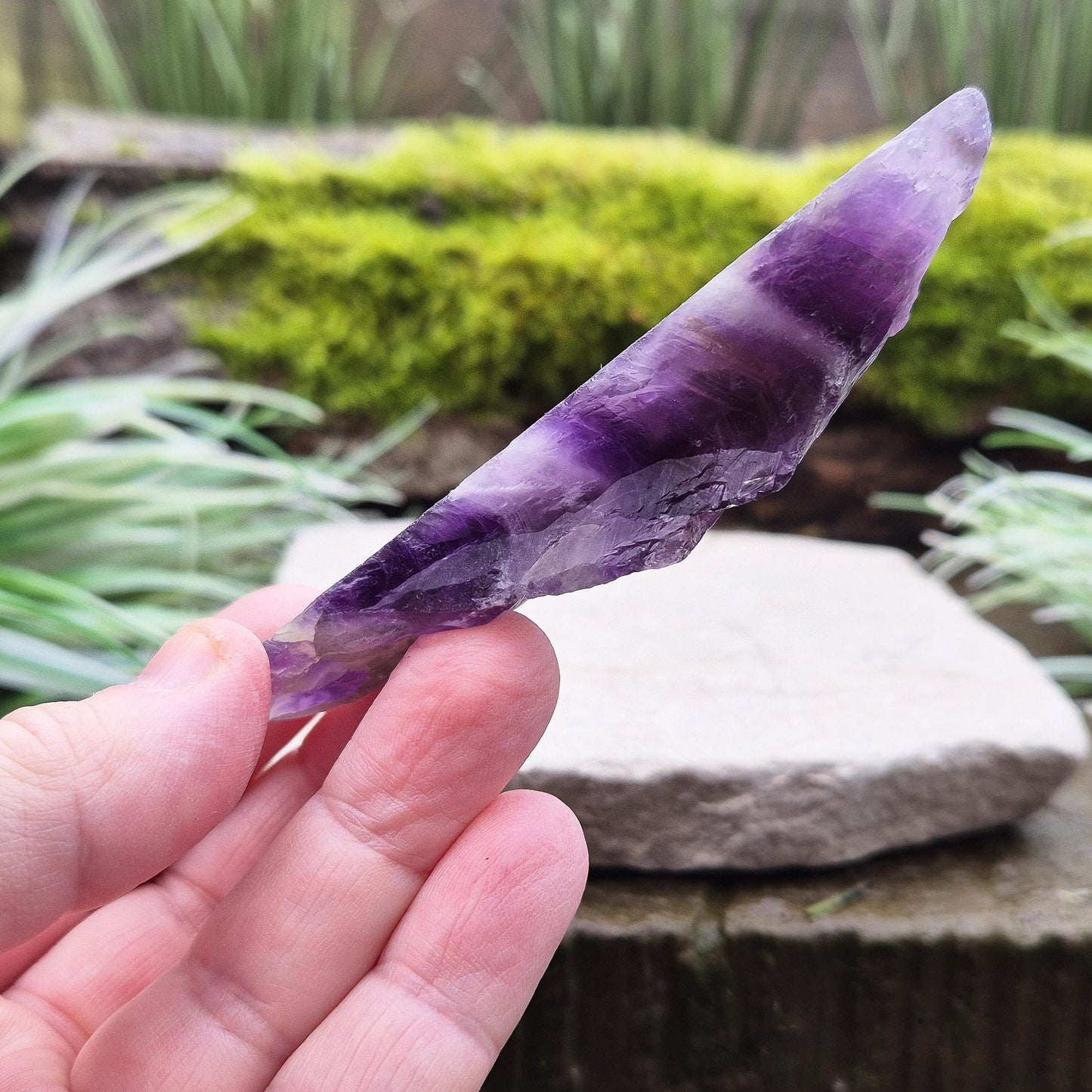 Chevron Amethyst Crystal Platform. One side is left untouched in its raw form, while the other is cut flat to create a versatile platform for displaying crystals, pendulums or jewellery or for practical use. 