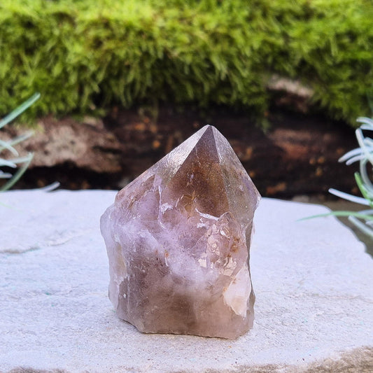 Discover harmony with our Ametrine Point – a stunning crystal that enhances intuition, reduces stress, and enahnces the energy in your space.
