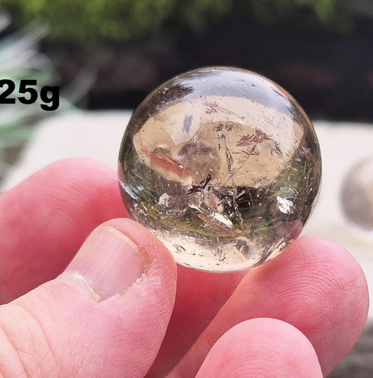 Smoky Quartz Sphere, Smoky Quartz Crystal Ball, Mini Sphere. Natural Smoky Quartz not Irradiated. Really nice clarity. Does not include a stand.