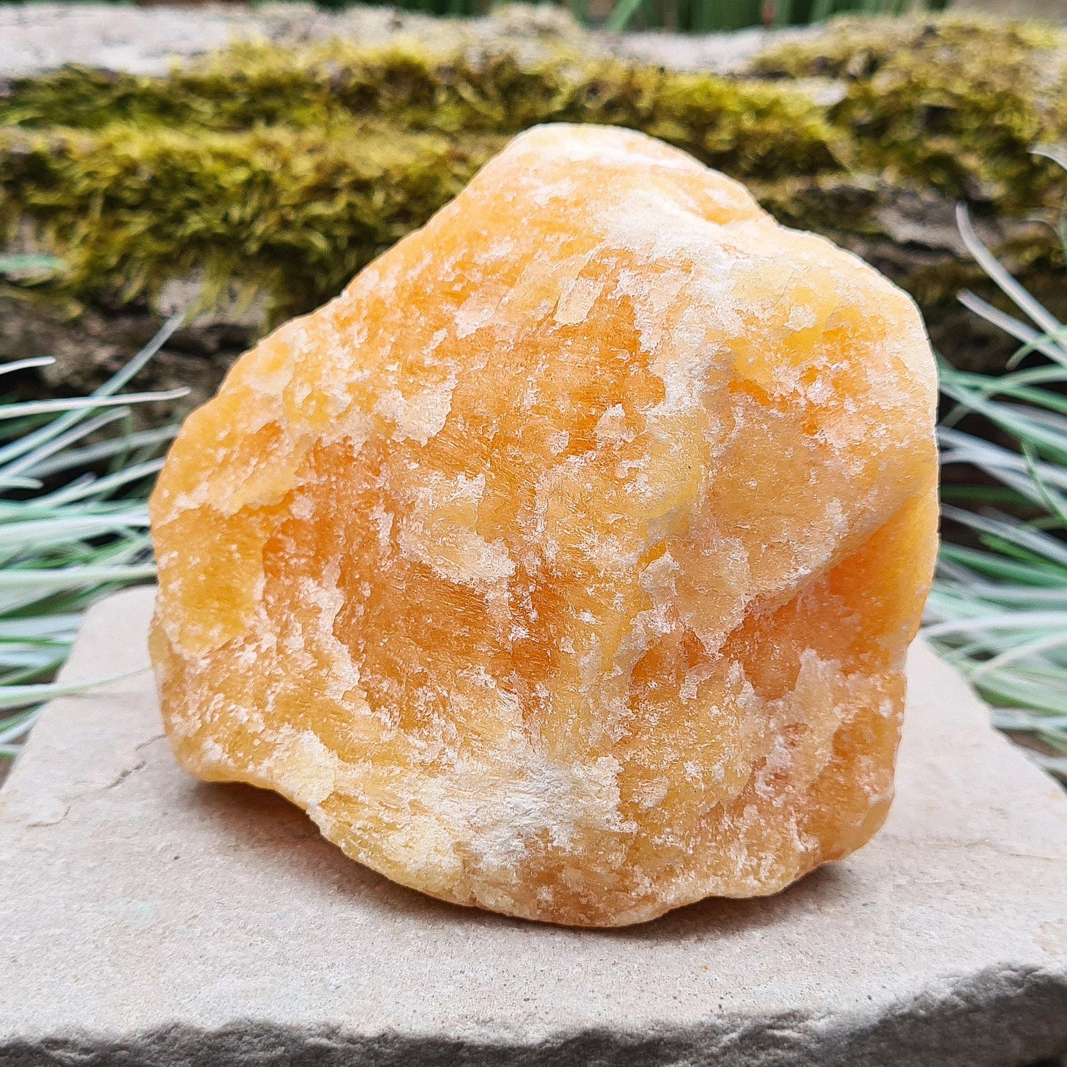 Natural Orange Calcite Crystal from Mexico. Lovely bright orange colour. This piece can be positioned upright.