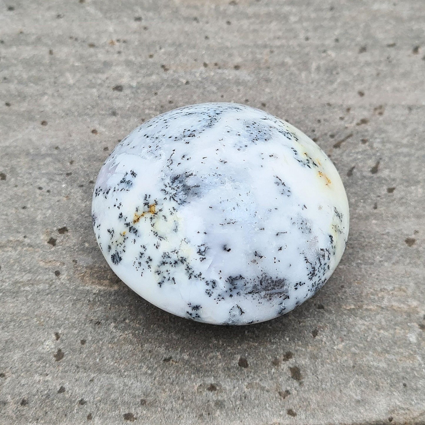 Merlinite Crystal from Madagascar. Fabulous, off white, grey and Lavender colouring. Merlinite Crystals are made up of White Opal and dendritic (fern like) inclusions